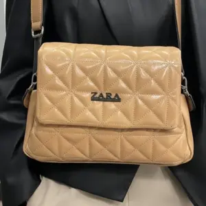 شنطه حريمي  بيج